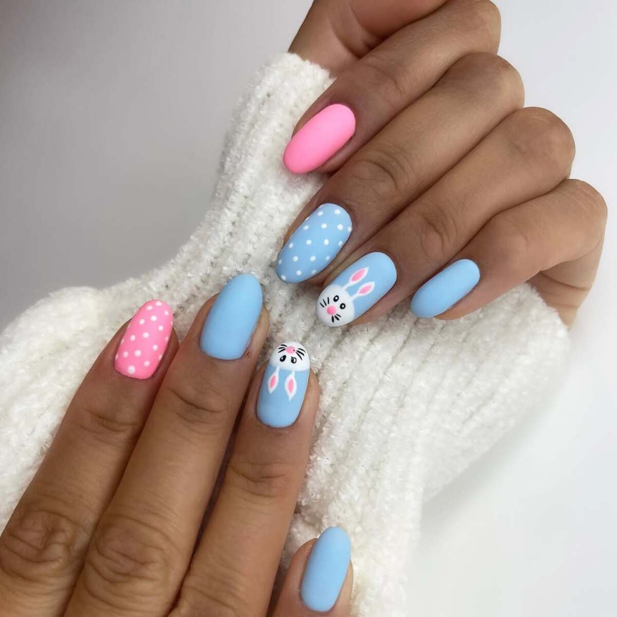 21. Matte Blue and Pink Bunny Nails