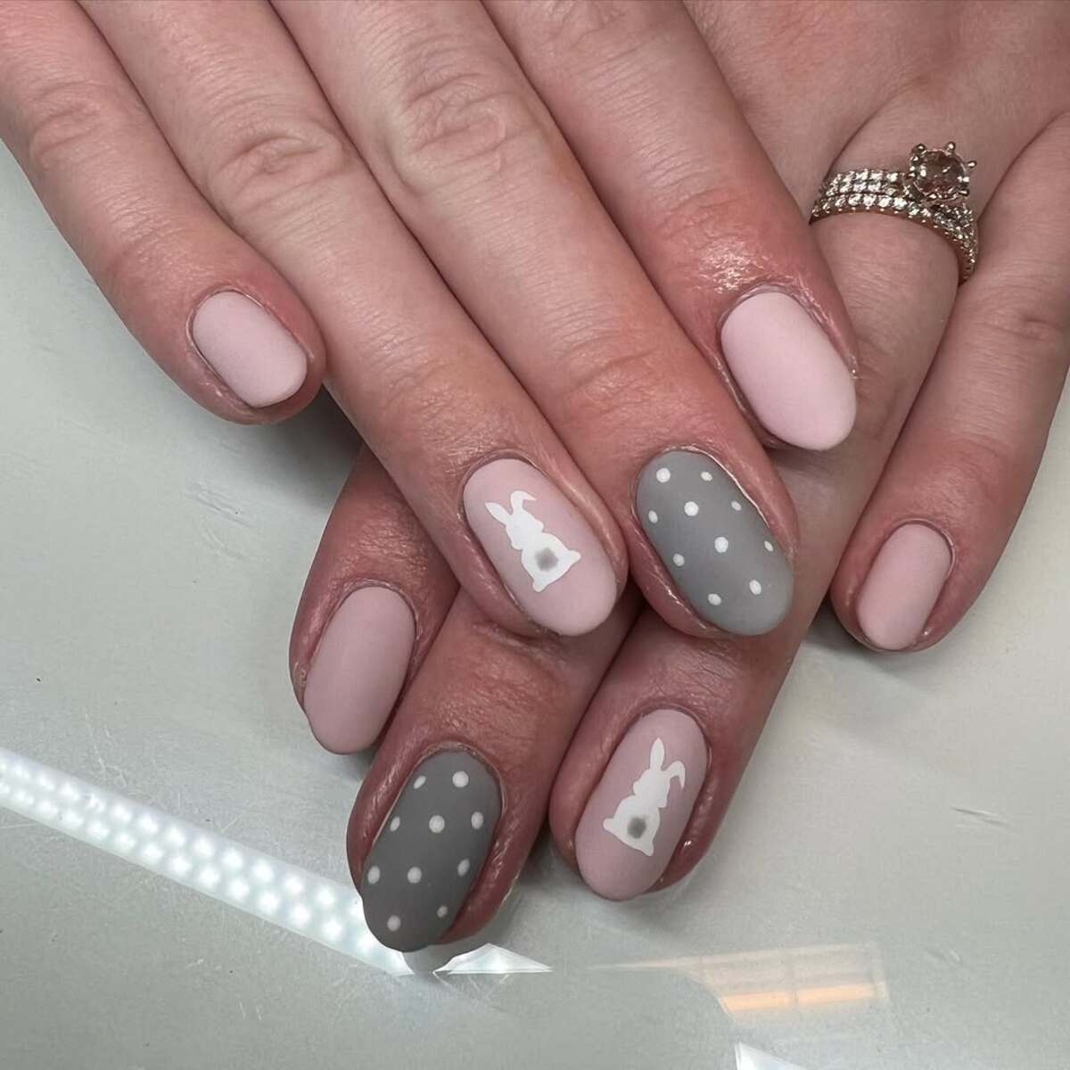 25. Neutral Bunny and Gray Polka Dot Nails