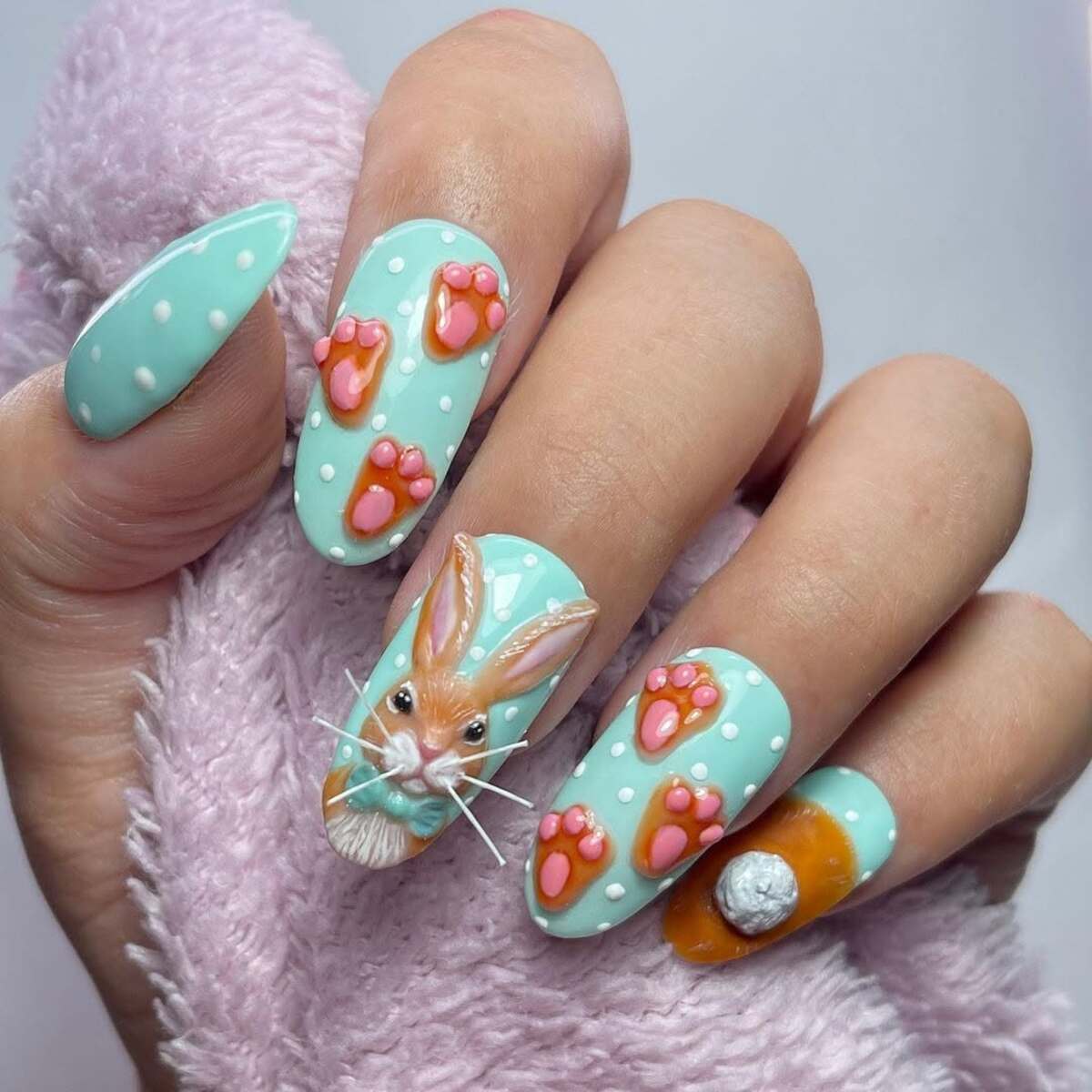 8. 3D Bunny and Paw Print Nails