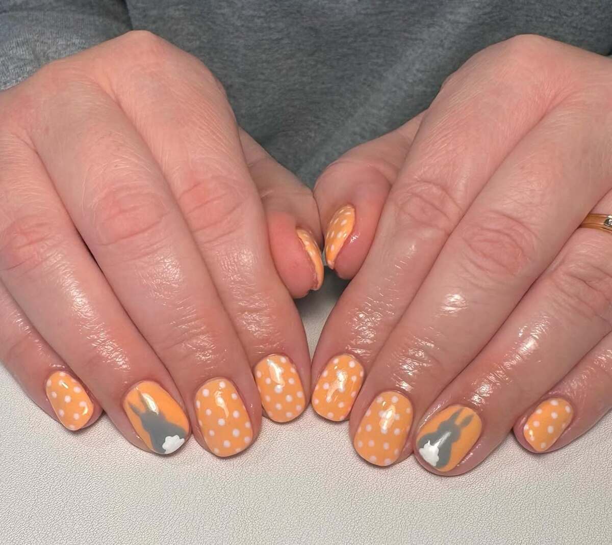 9. Orange Bunny Silhouette Nail Art