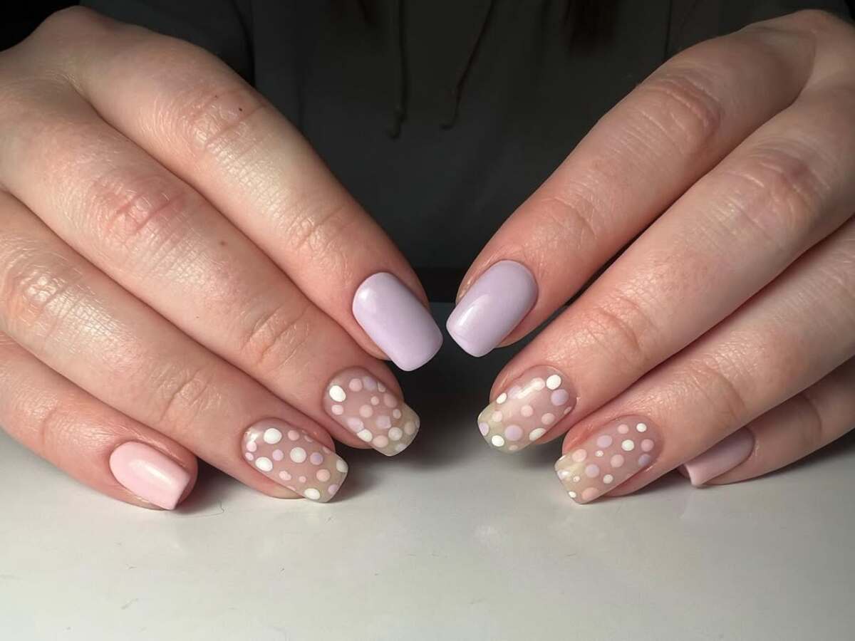 21. Soft Lilac and Sheer Polka Dot French Tips