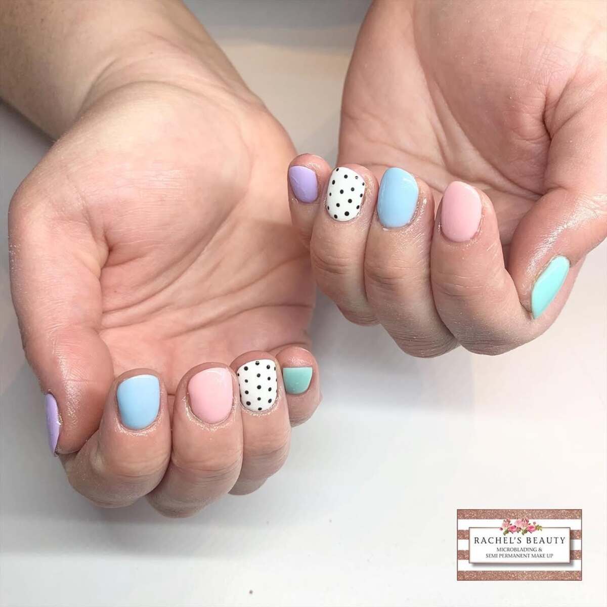 26. Pastel Patchwork with a Chic Polka Dot Accent