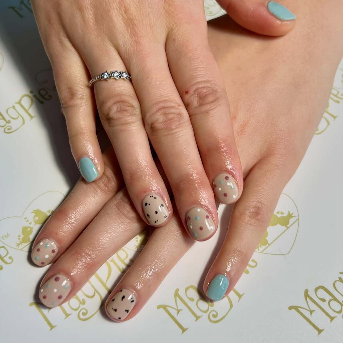 4. Minimalist Nude Nails with Colorful Accents