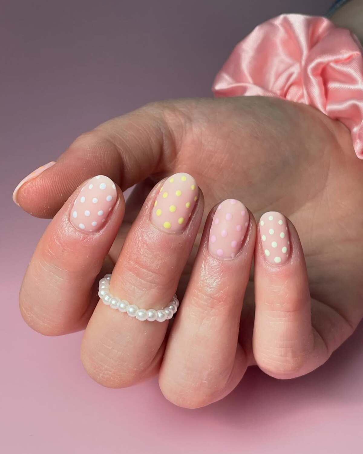 6. Soft Pink Elegance with Delicate Polka Dots