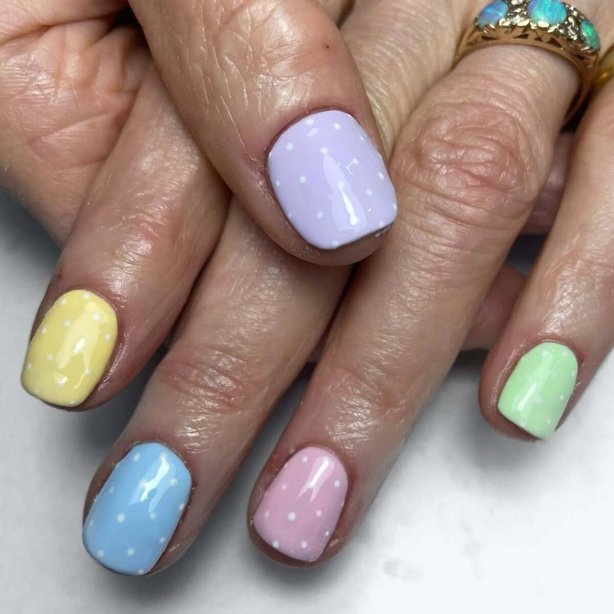 7. Glossy Pastel Perfection with Tiny White Dots