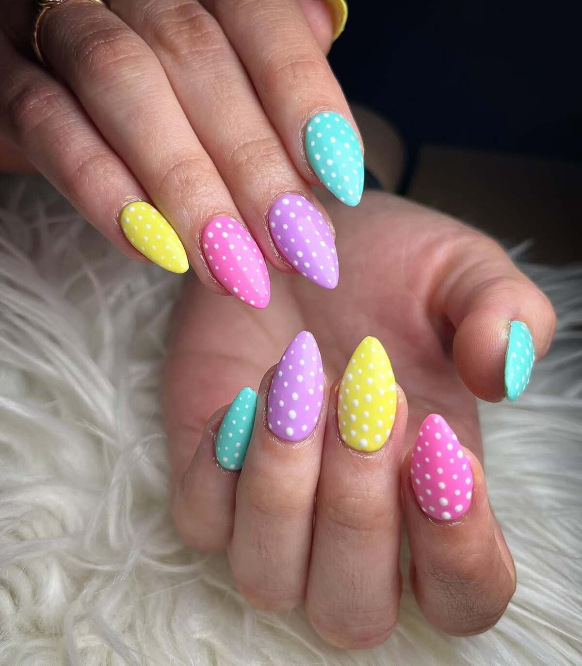 9. Bright and Colorful Almond Nails with Polka Dots