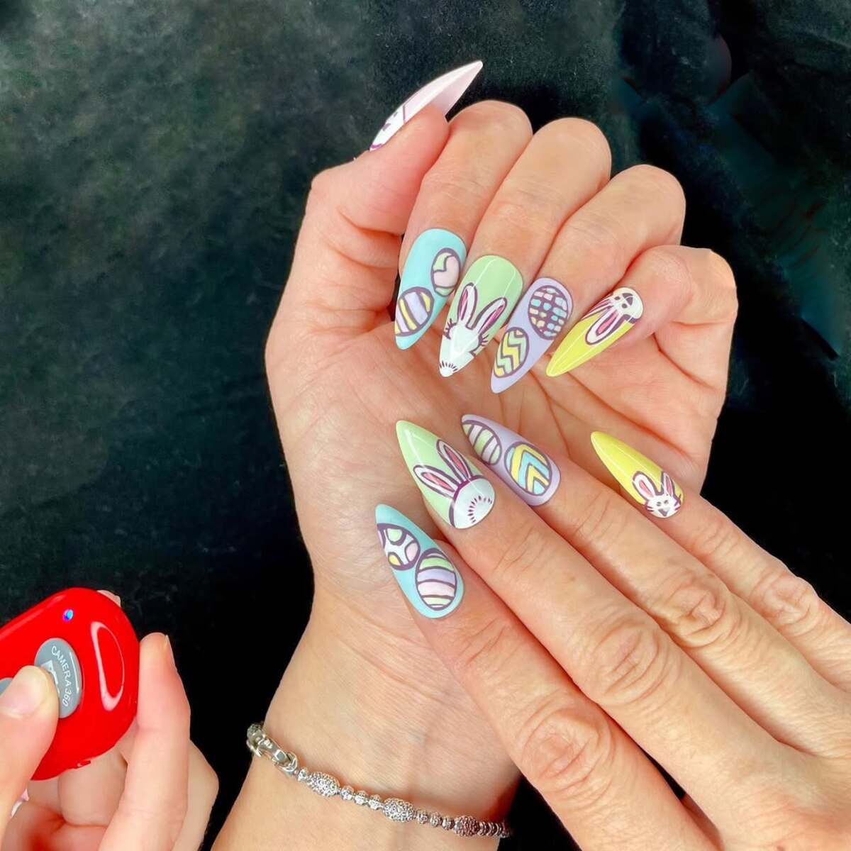 13. Hand-Painted Bunny and Easter Egg Nail Art