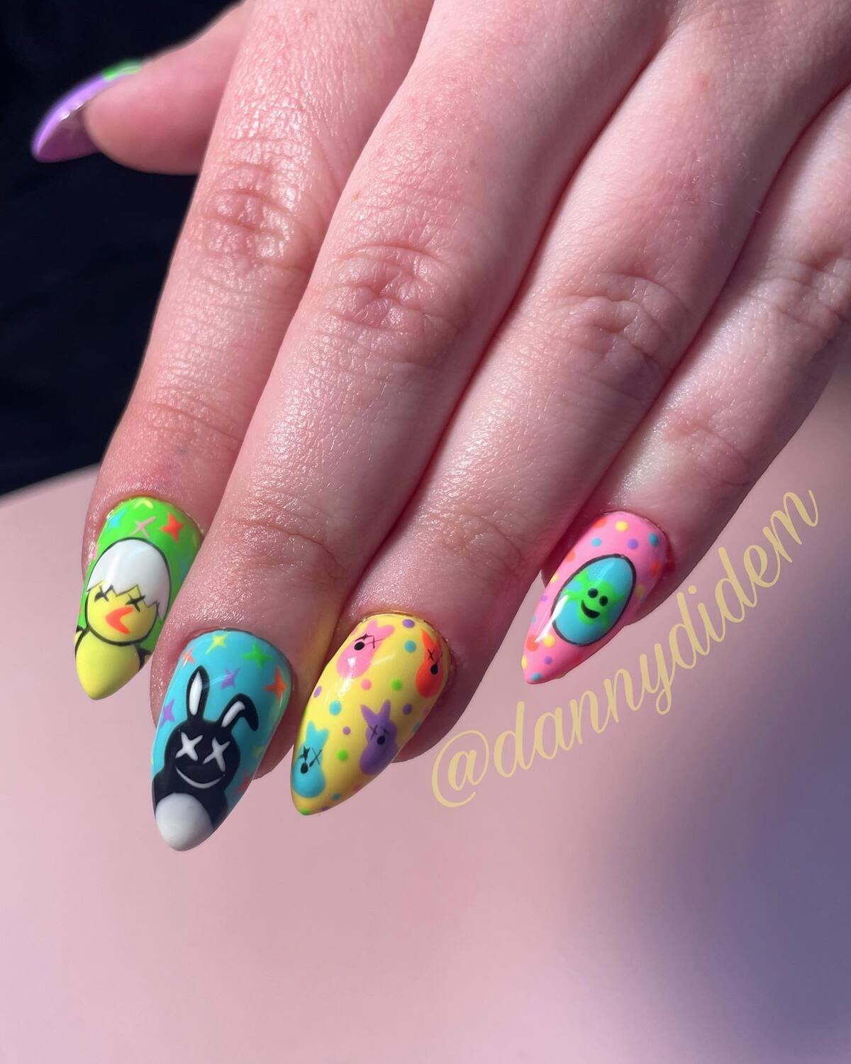 22. Playful Neon Easter Nails with a Dark Twist