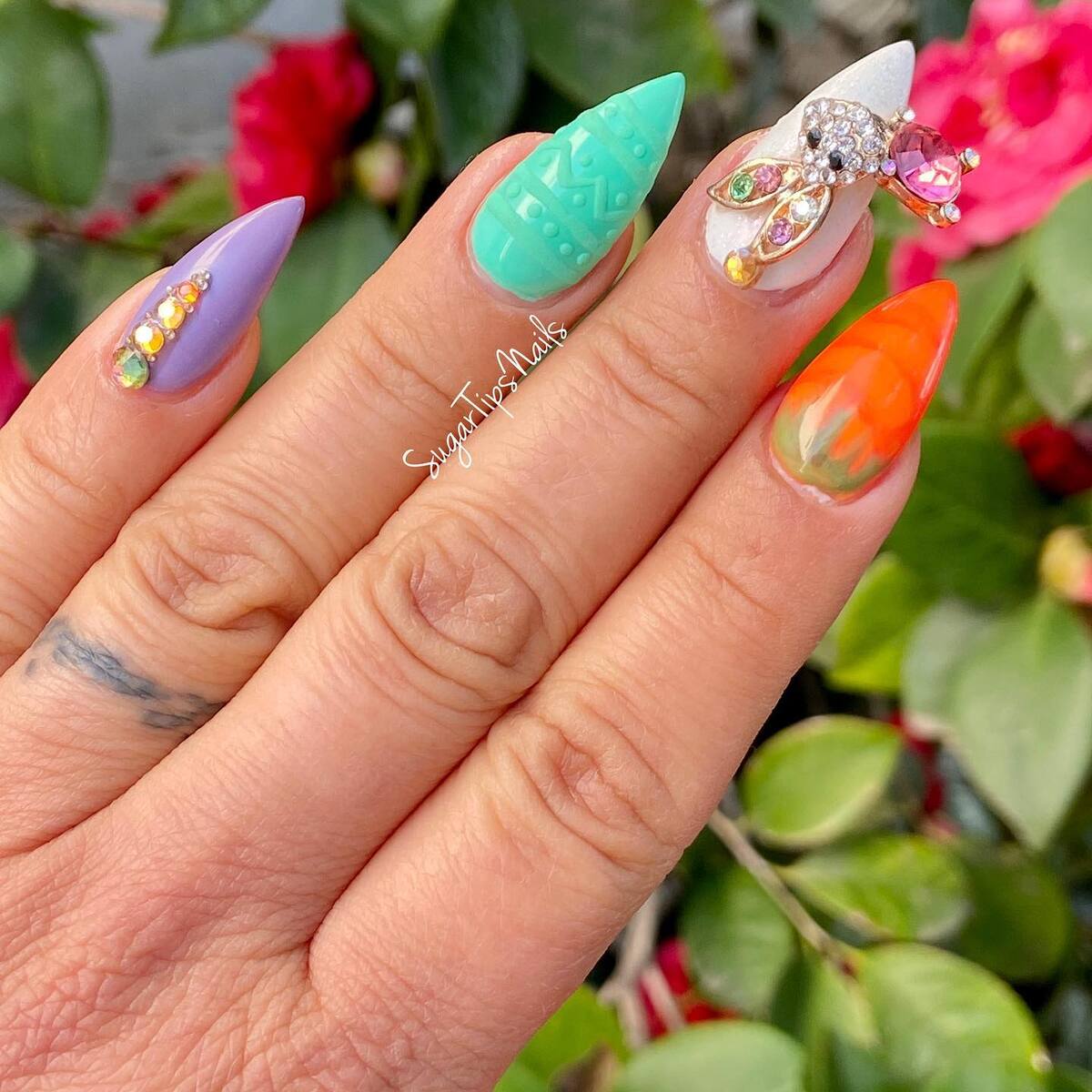 24. Luxe Pastel Nails with 3D Bunny Charm