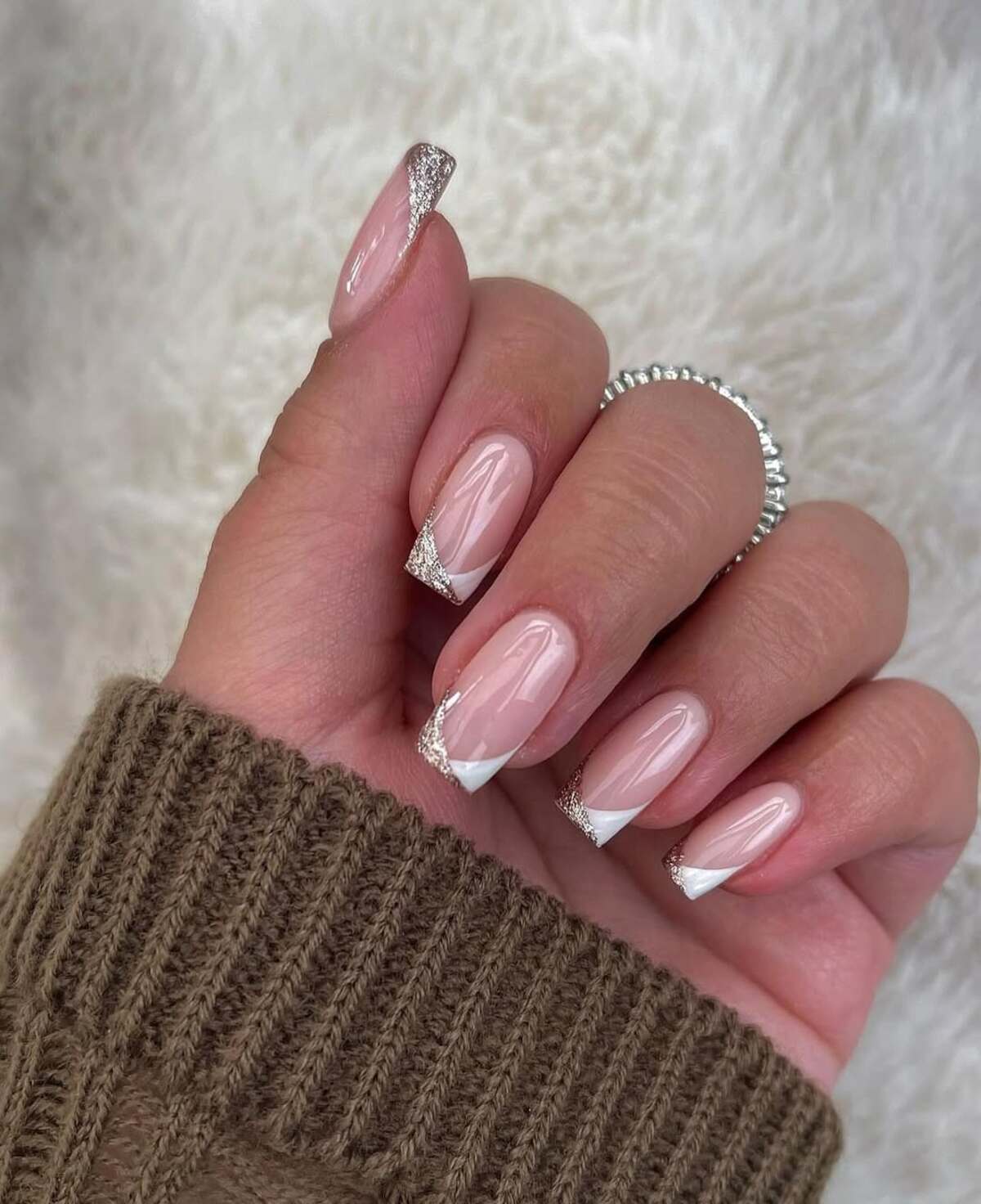 1. Classic French Tips with a Glittery Twist