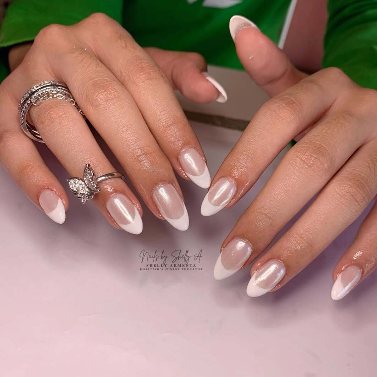 4. Pearl White French Tips for a Soft Glow