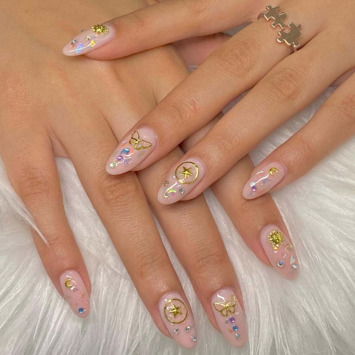 20. Celestial-Inspired Golden Nail Art