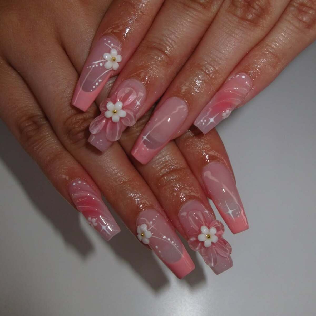 10. Glossy Pink Coffin Nails with 3D Daisy Details