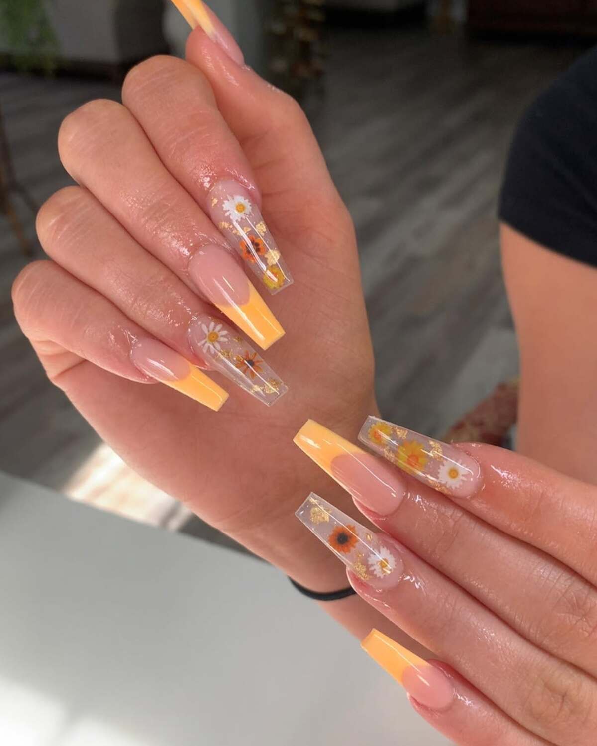 2. Sunflower-Inspired Transparent French Tips