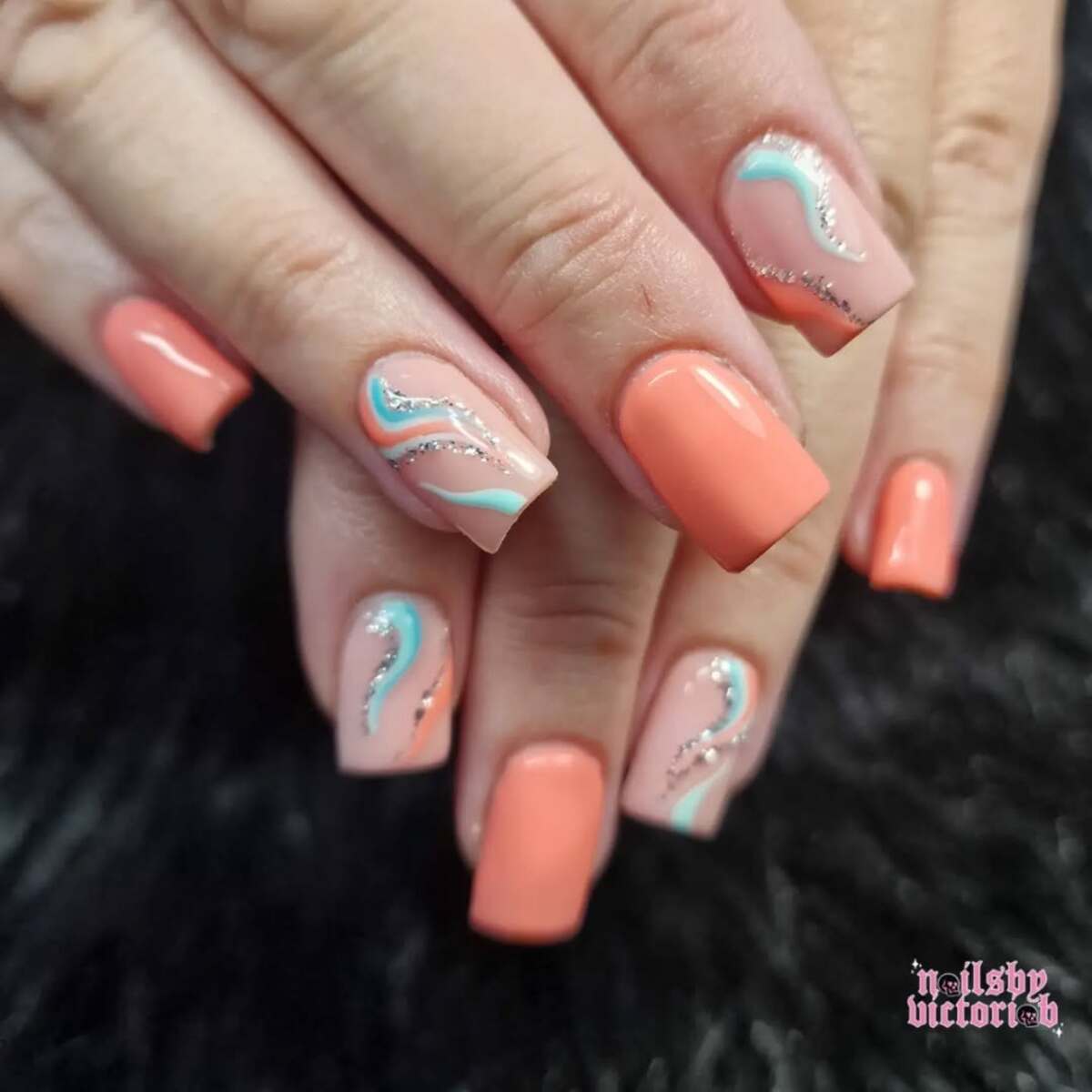 17. Elegant Coral and Mint Swirls
