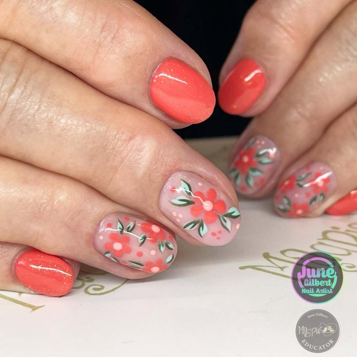 21. Delicate Floral Coral and Mint Nails