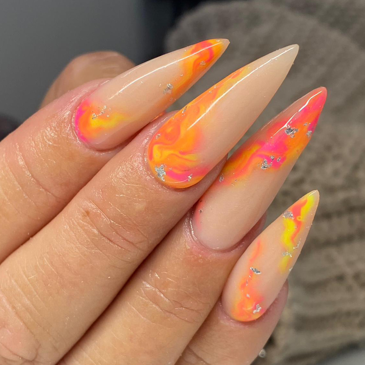 19. Fiery Orange and Pink Marble Effect