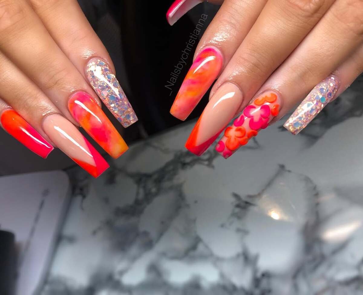 22. Fiery Ombre with Floral and Glitter Accents