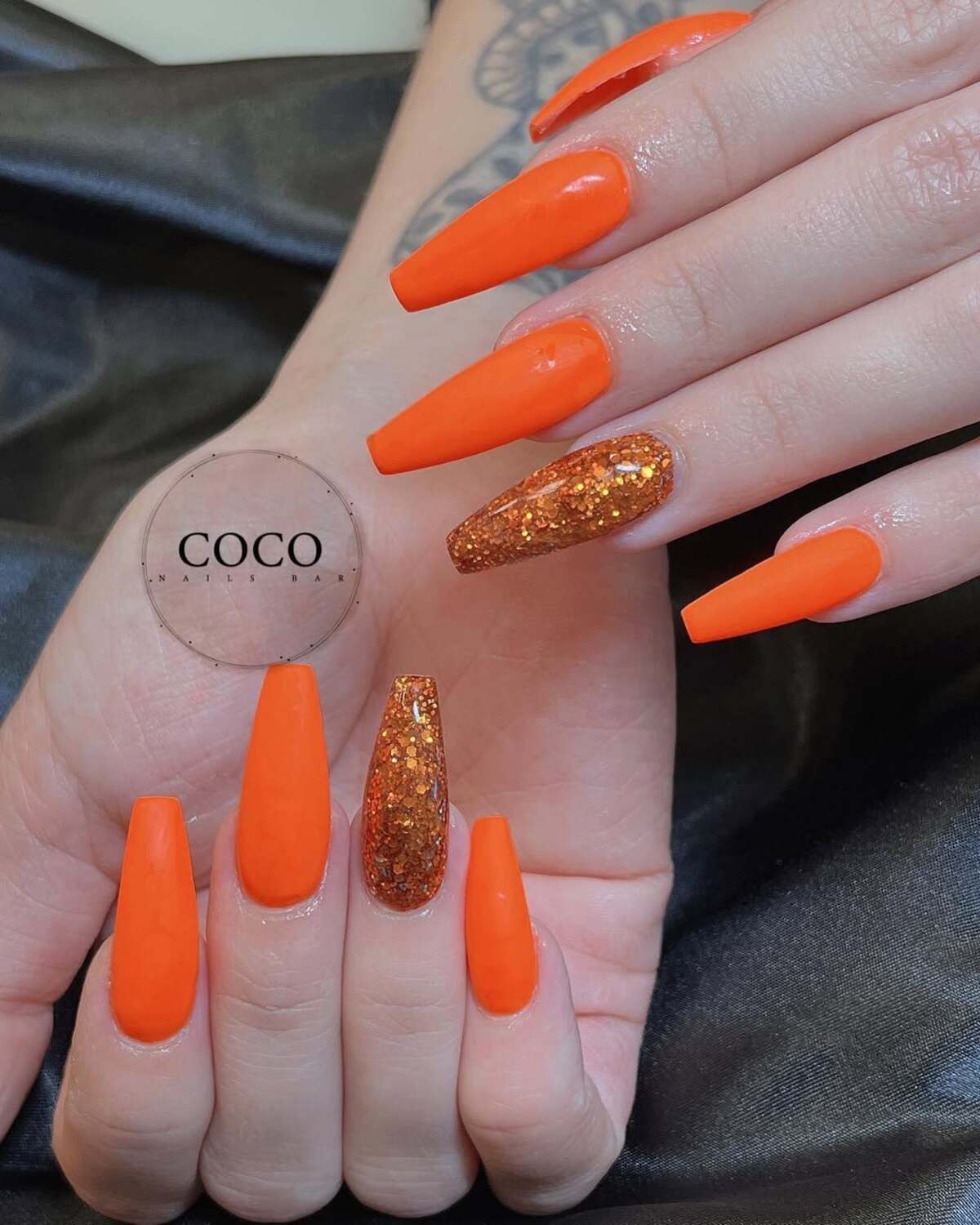 29. Bold Neon Orange with Glitter Accent