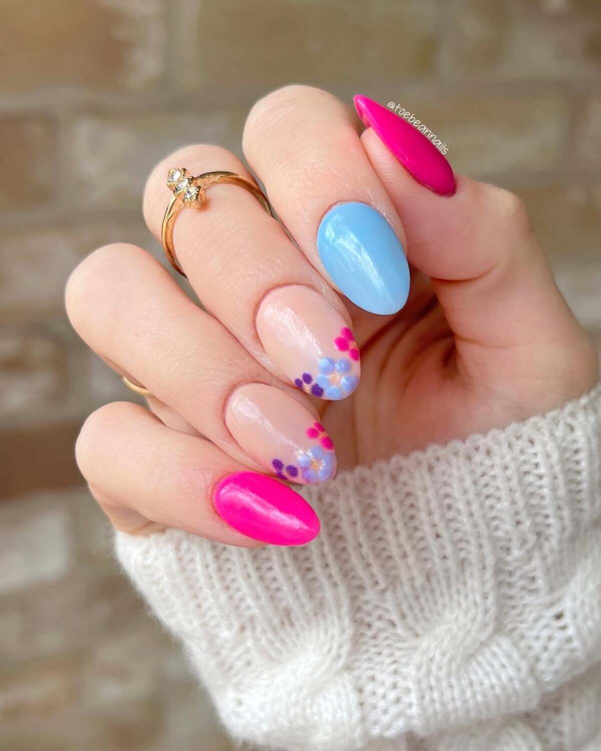 11. Vibrant French Tips with Colorful Floral Details