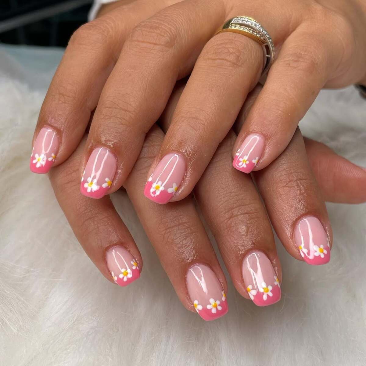 17. Soft Pink French Tips with Miniature Daisies