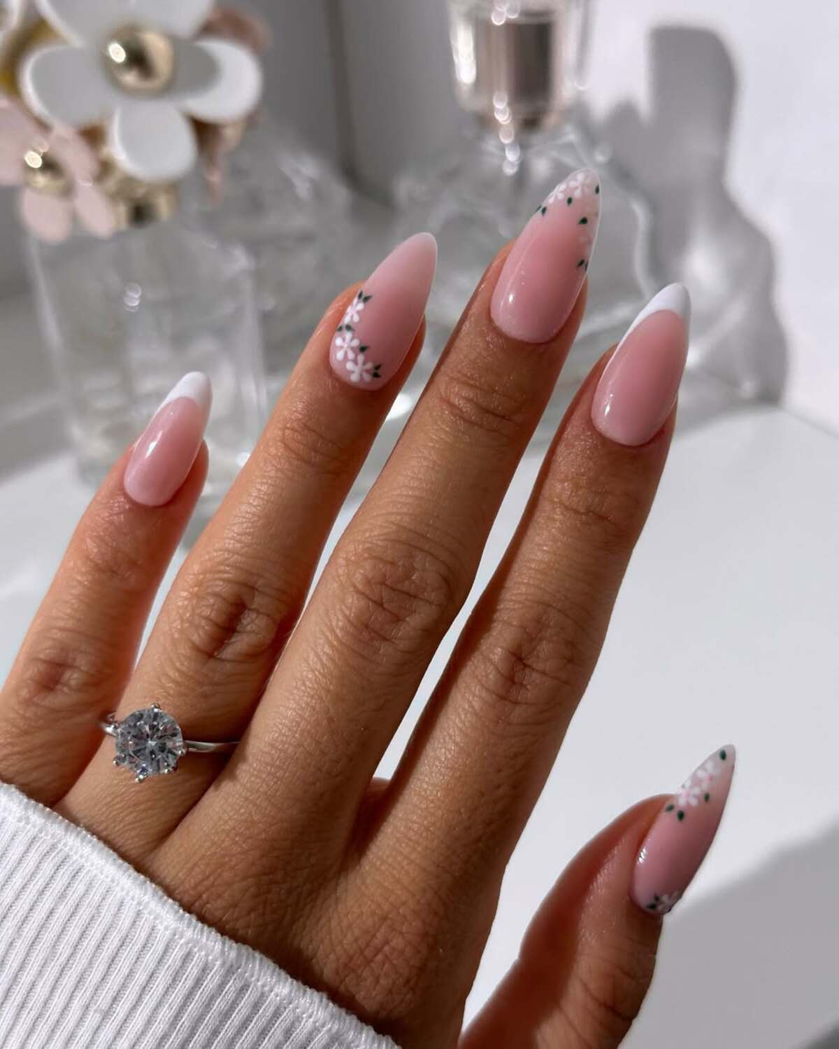 5. Chic Almond French Tips with Minimalist Florals