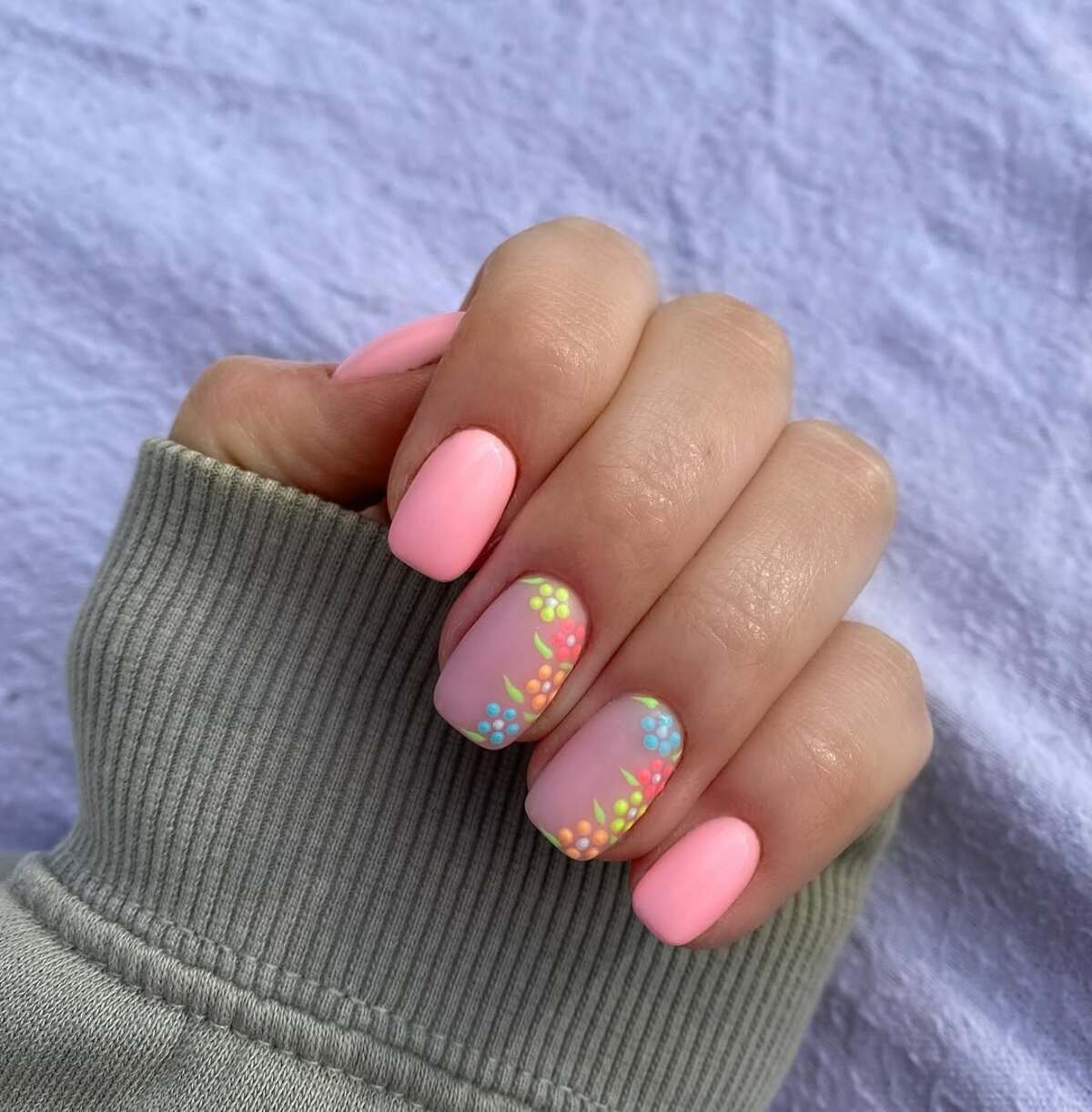 12. Soft Blush Nails with Tiny Floral Accents