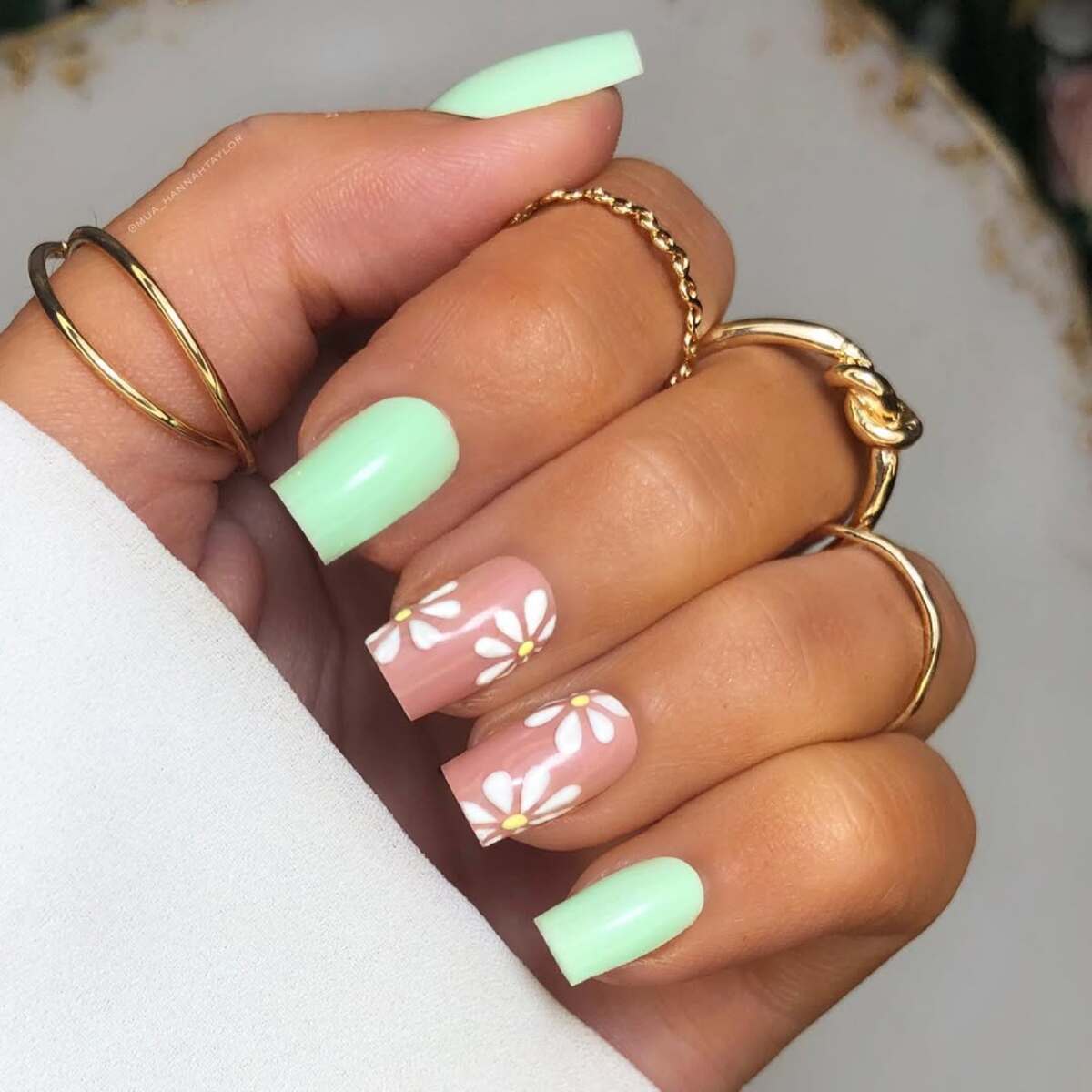 14. Delicate Mint and Blush Nails with Daisy Accents