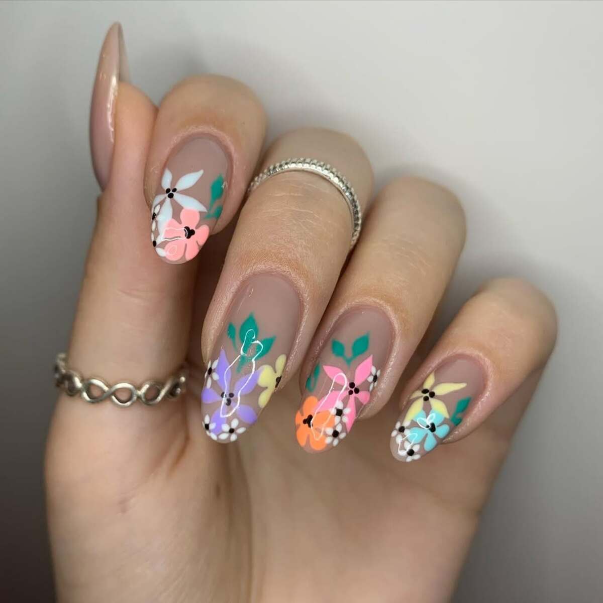 16. Vibrant Wildflower French Tips