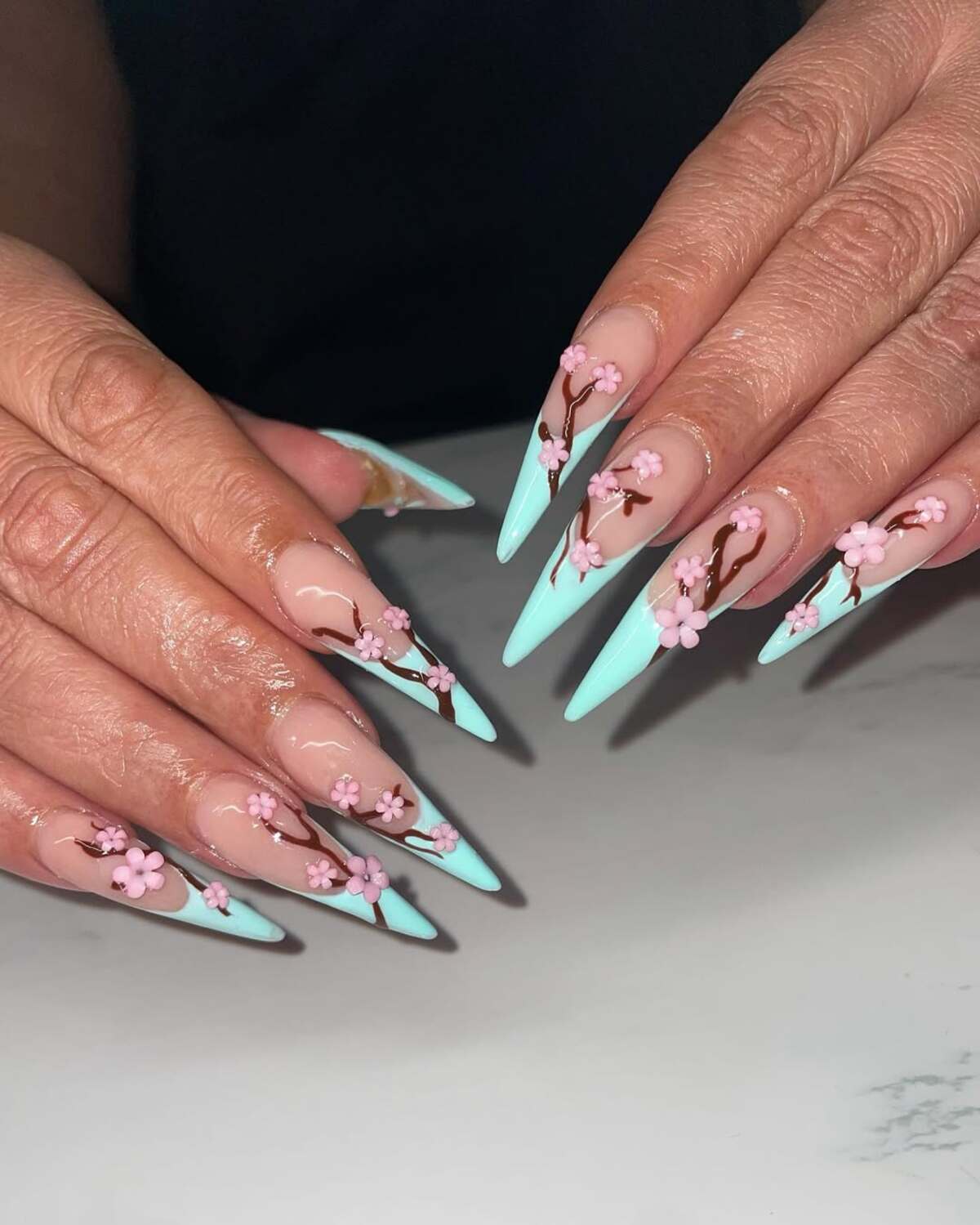 5. Ethereal Cherry Blossom Stiletto Nails