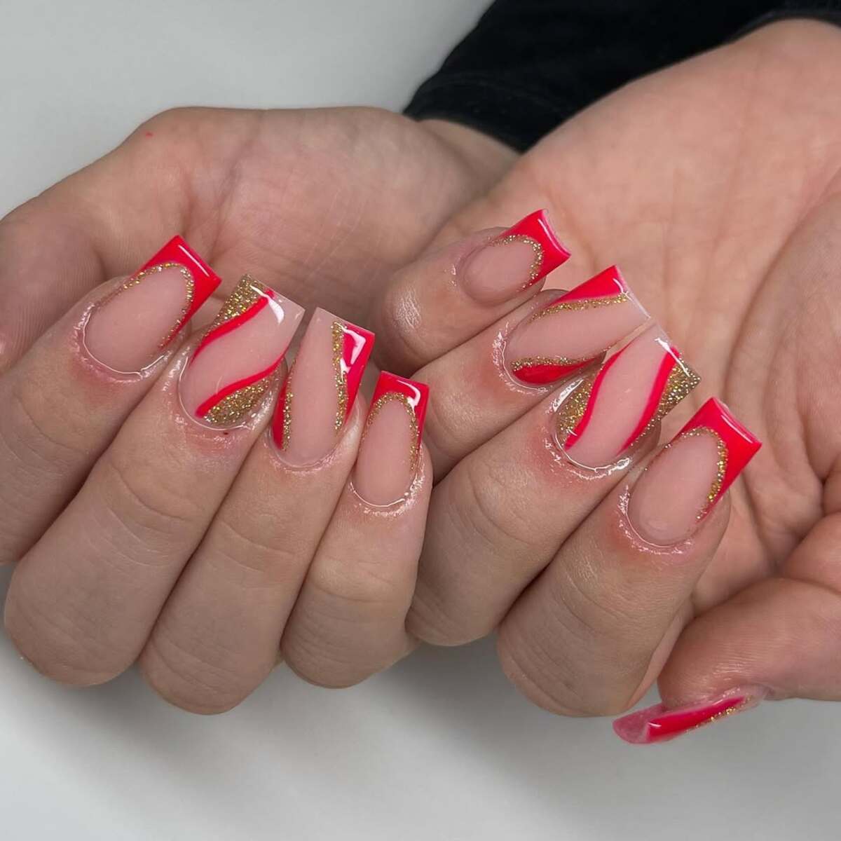 12. Red and Gold Glitter French Tips