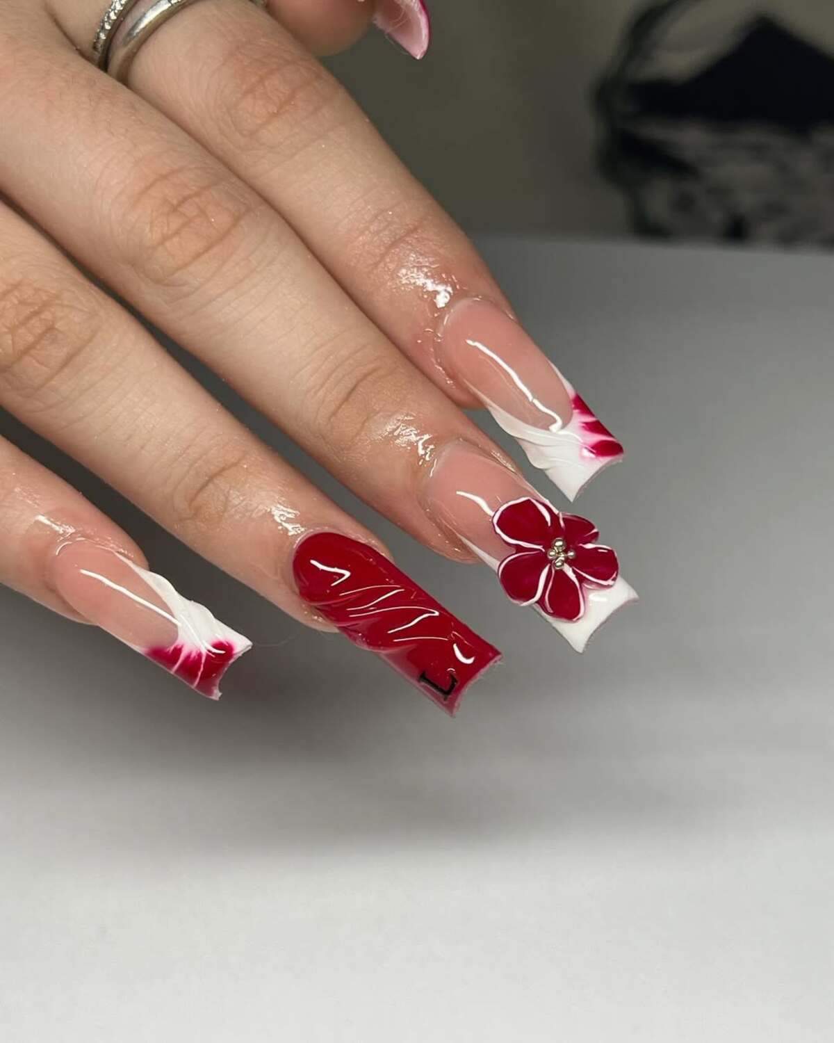 13. Elegant Red Floral 3D Nail Art