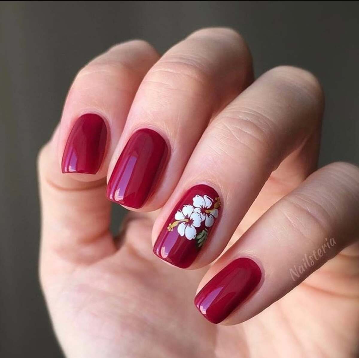 15. Deep Red with a Delicate Floral Accent