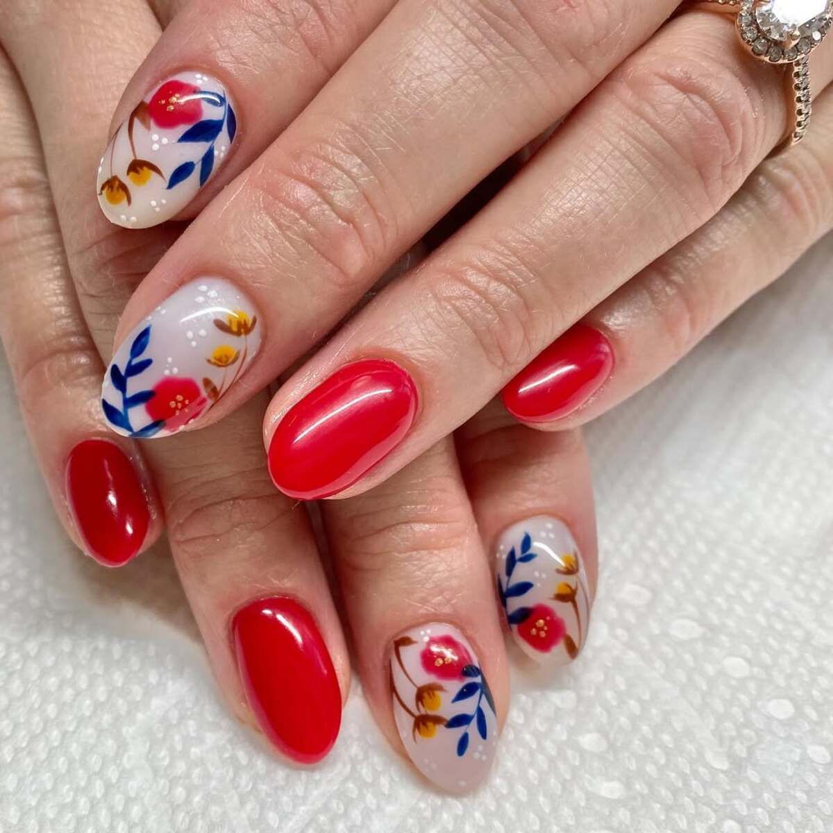 19. Bold Red with Hand-Painted Floral Accents