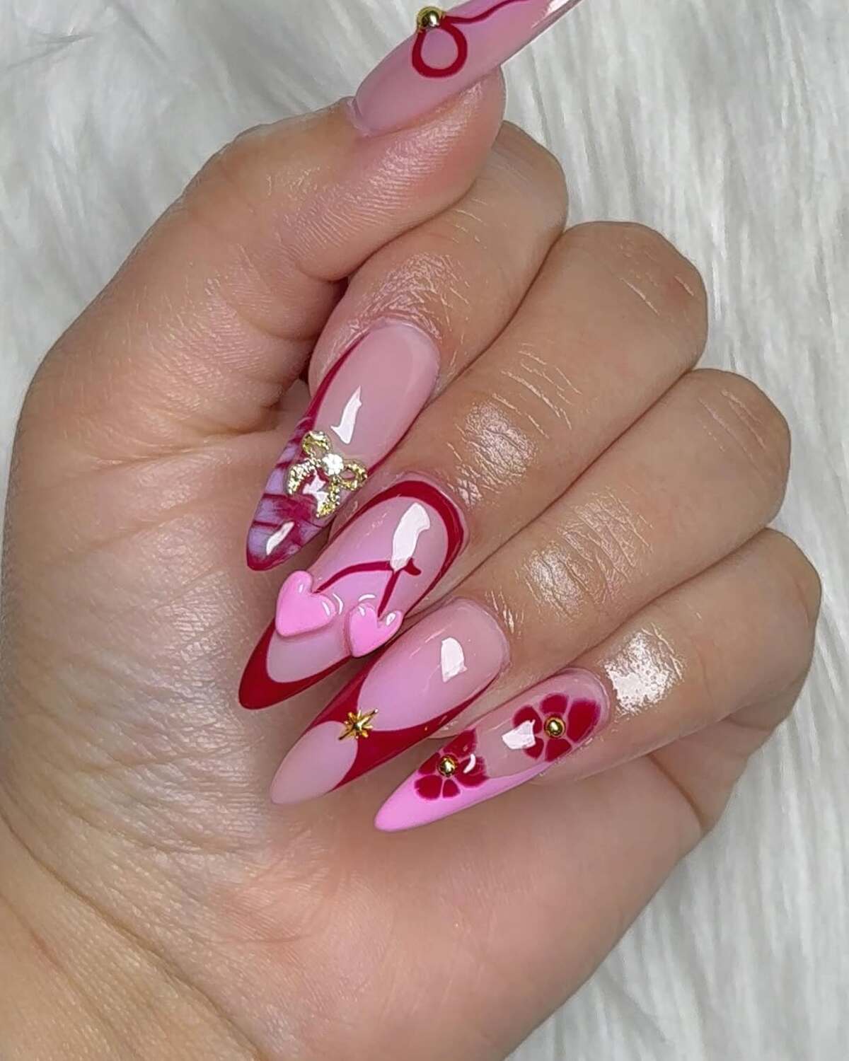 20. Romantic Red and Pink Heart Nail Design