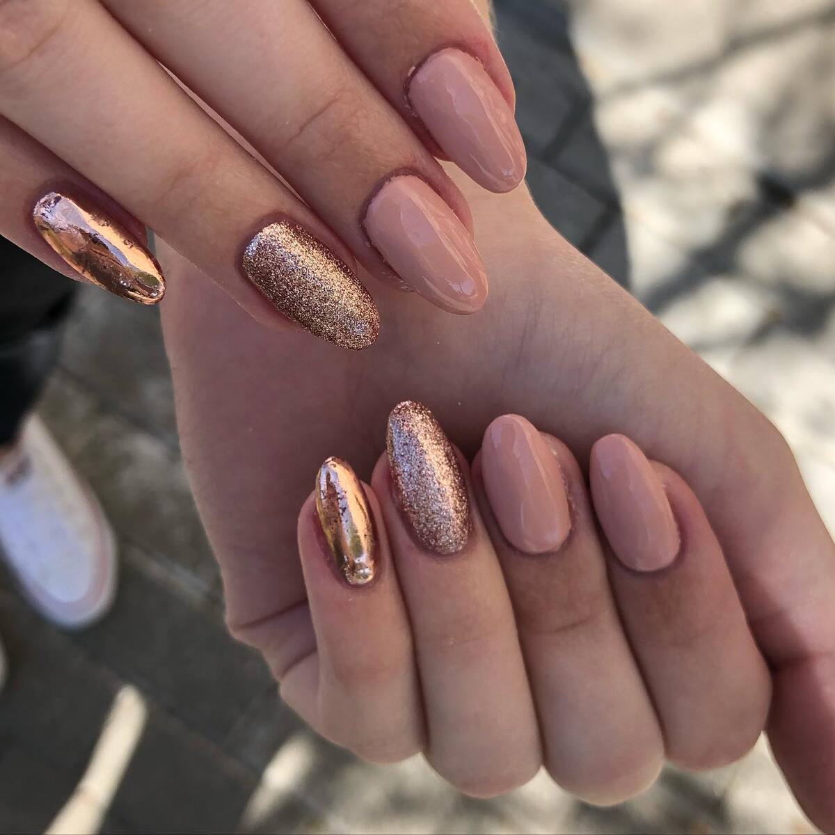 17. Nude and Rose Gold Glam Nails