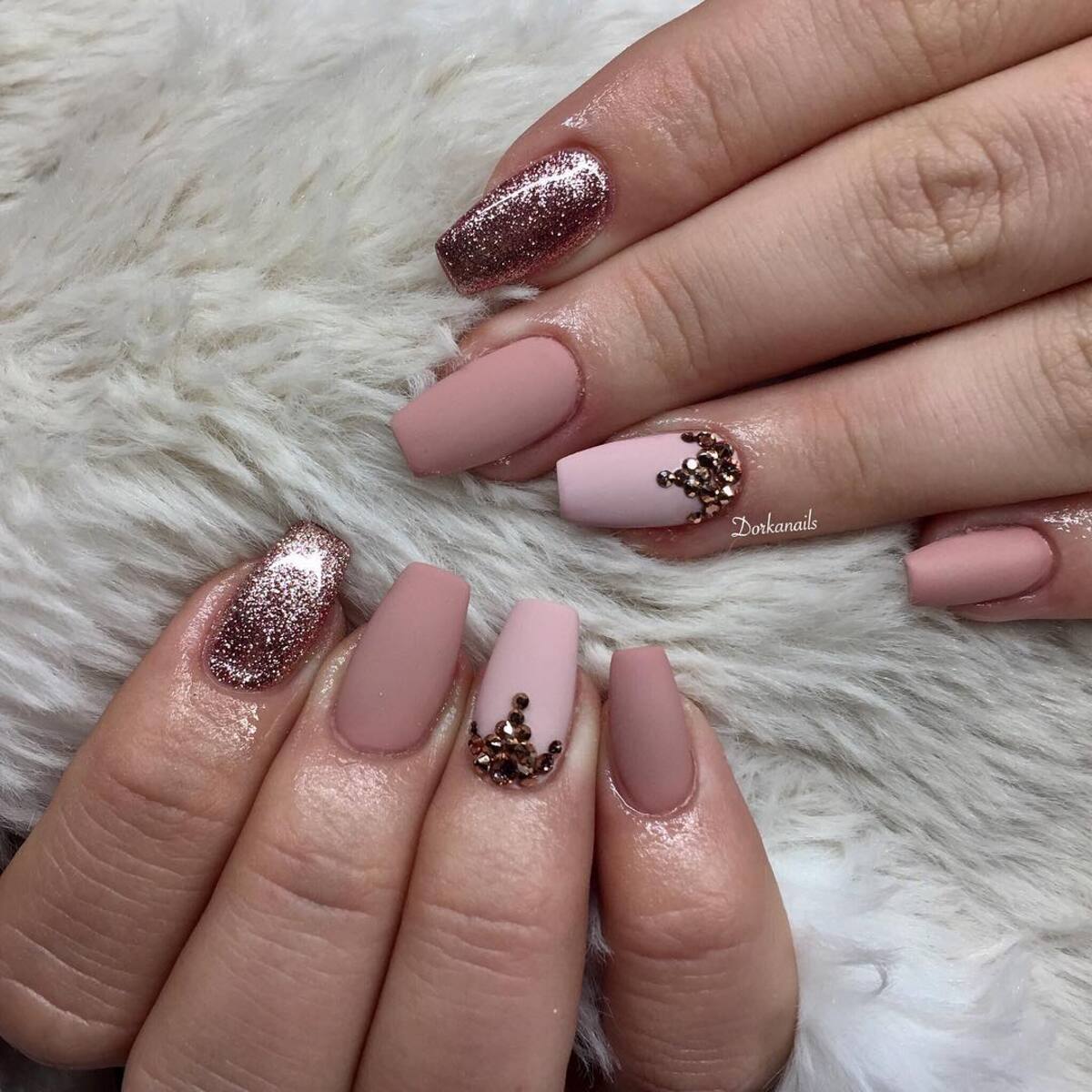 18. Matte and Glitter Rose Gold Nails with Rhinestones