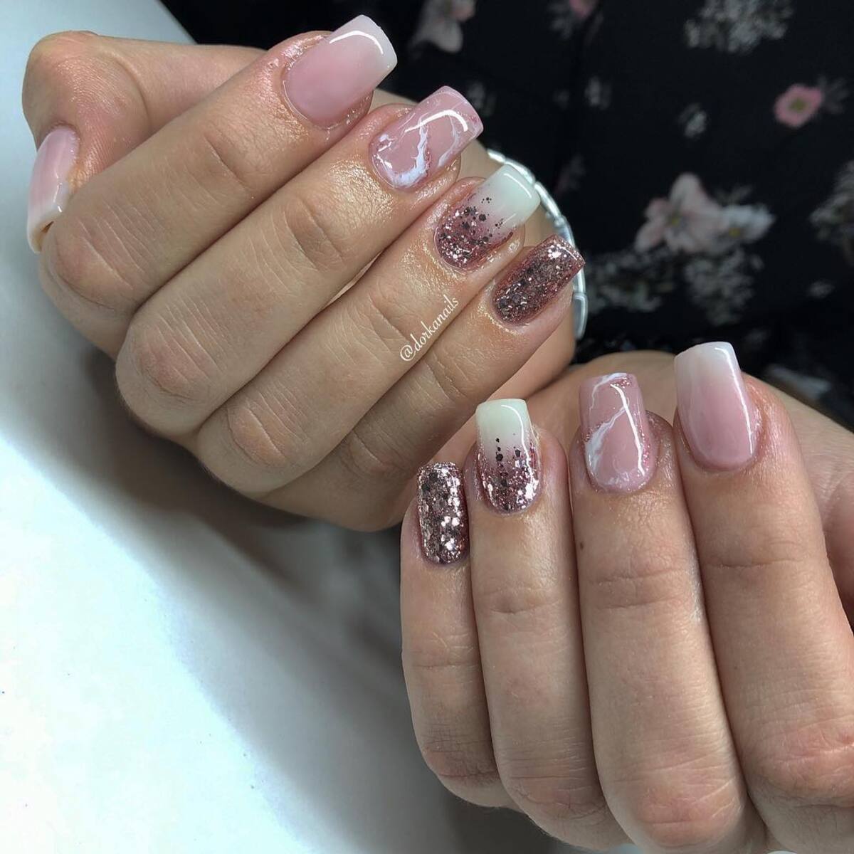 21. Soft Marble and Rose Gold Glitter Nails