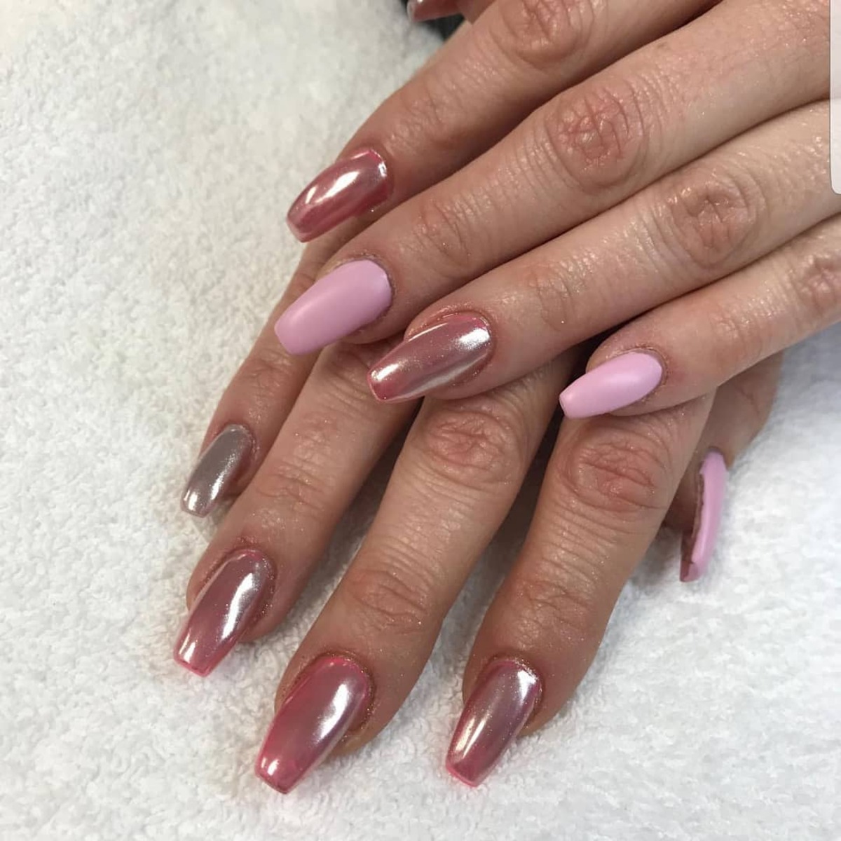 24. Shimmering Chrome and Pastel Rose Gold Nails