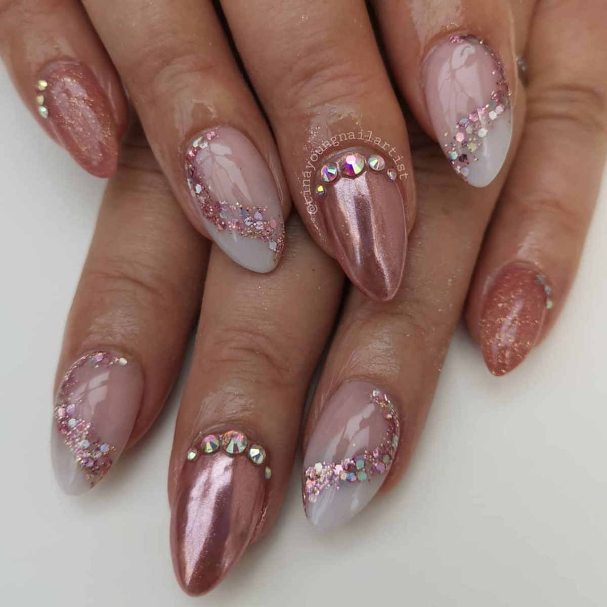 4. Elegant Rose Gold Nails with Crystal Accents