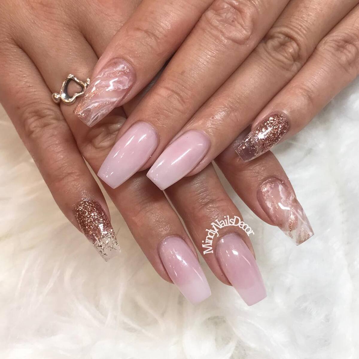 7. Classic Pink and Gold Marble Nails