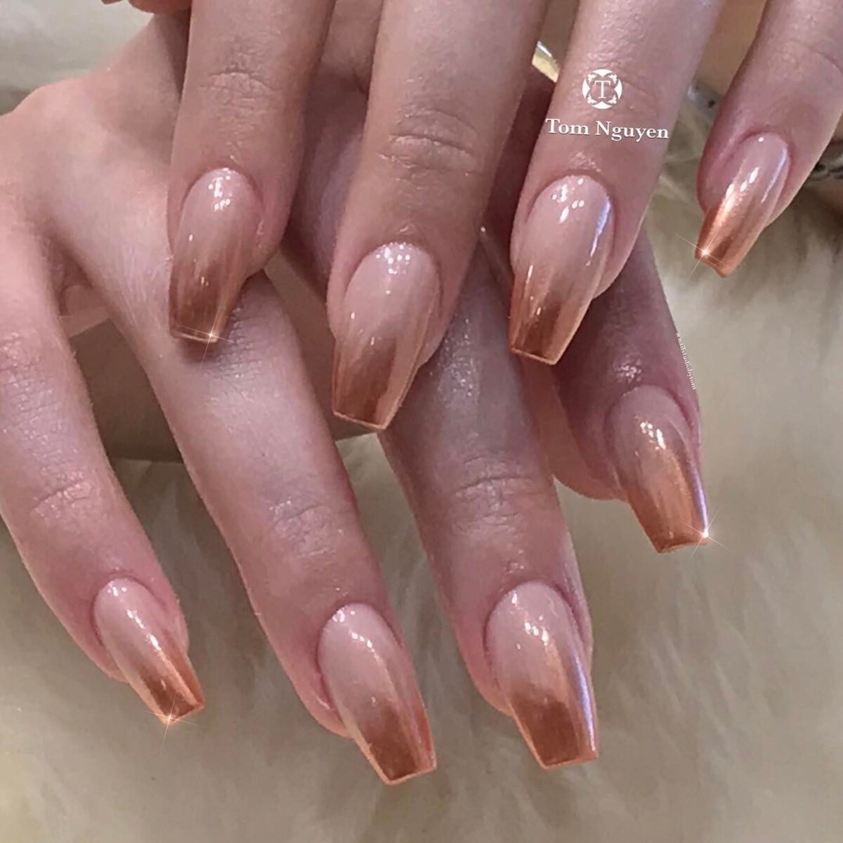 8. Subtle Rose Gold Ombre Nails