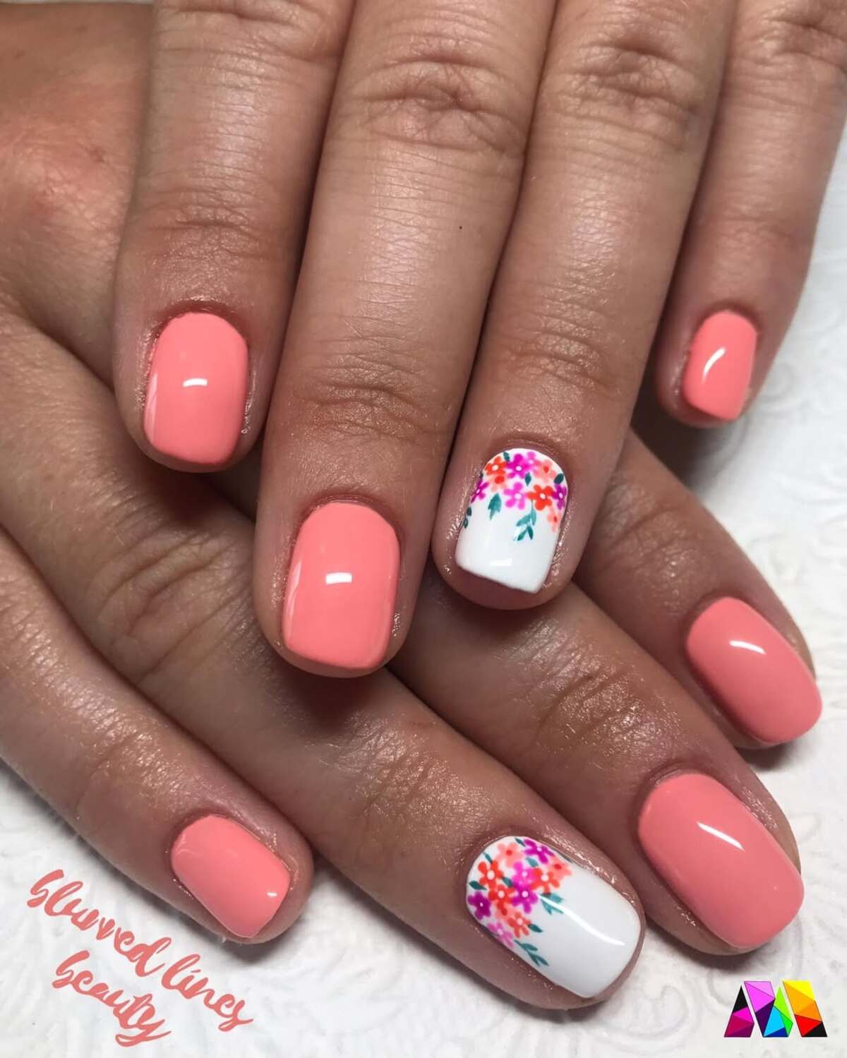12. Simple Coral with a Pop of Floral Art