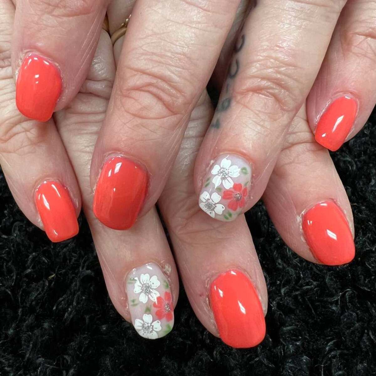15. Vivid Coral with Subtle Botanical Touches