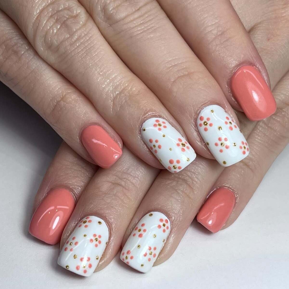 23. Classic Coral and White with Tiny Floral Dots