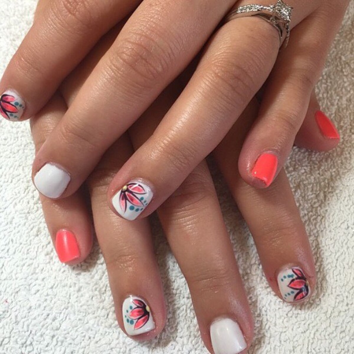 25. Coral and White Floral Elegance