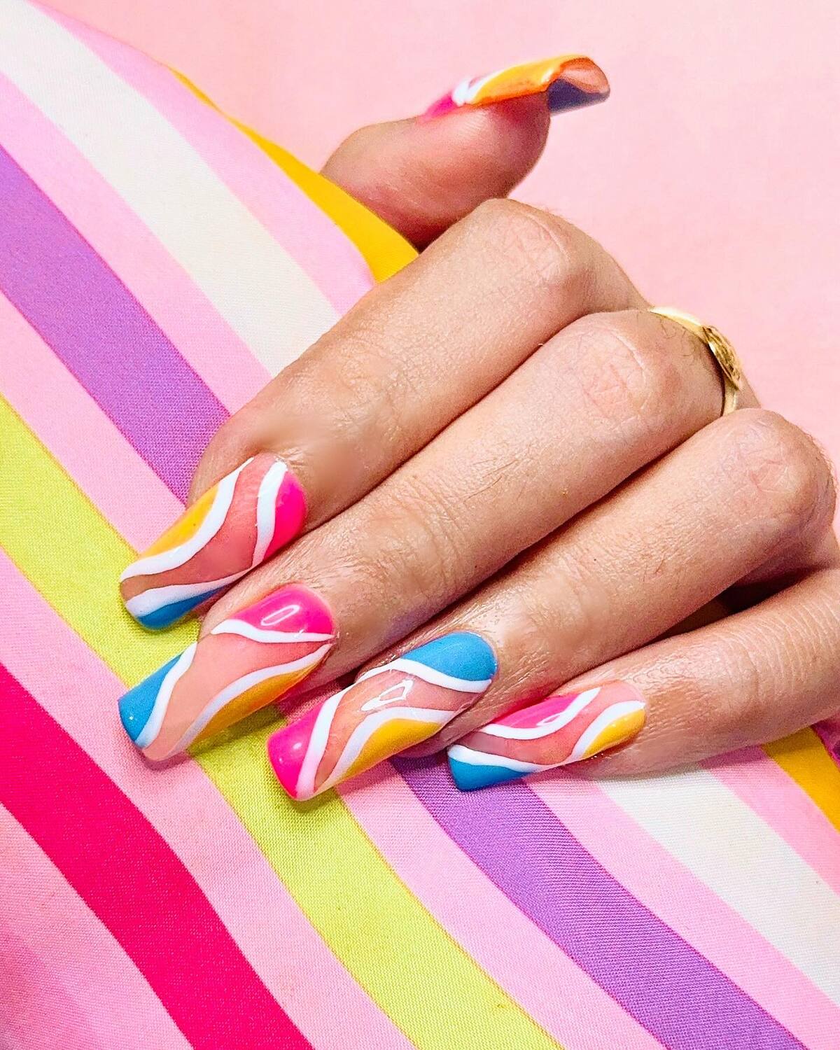 14. Bold and Bright Neon Swirls with a Retro Twist