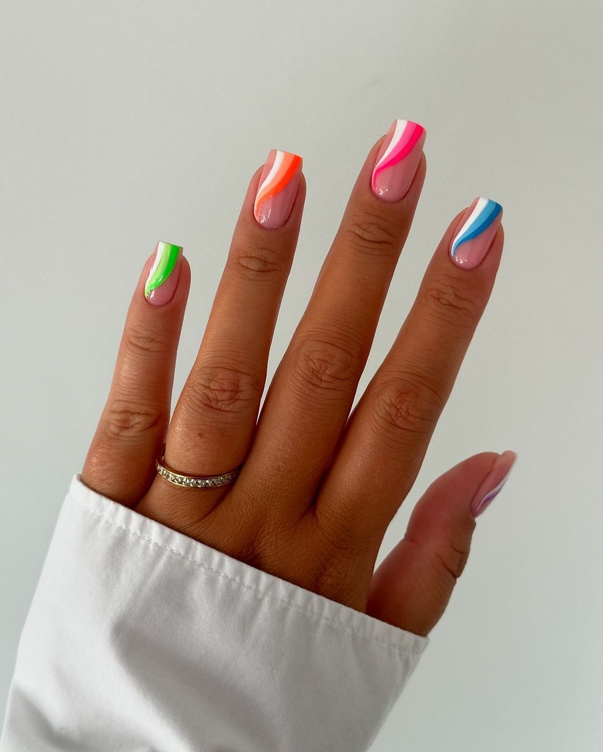 16. Minimalist Neon Swirls for a Sleek Look