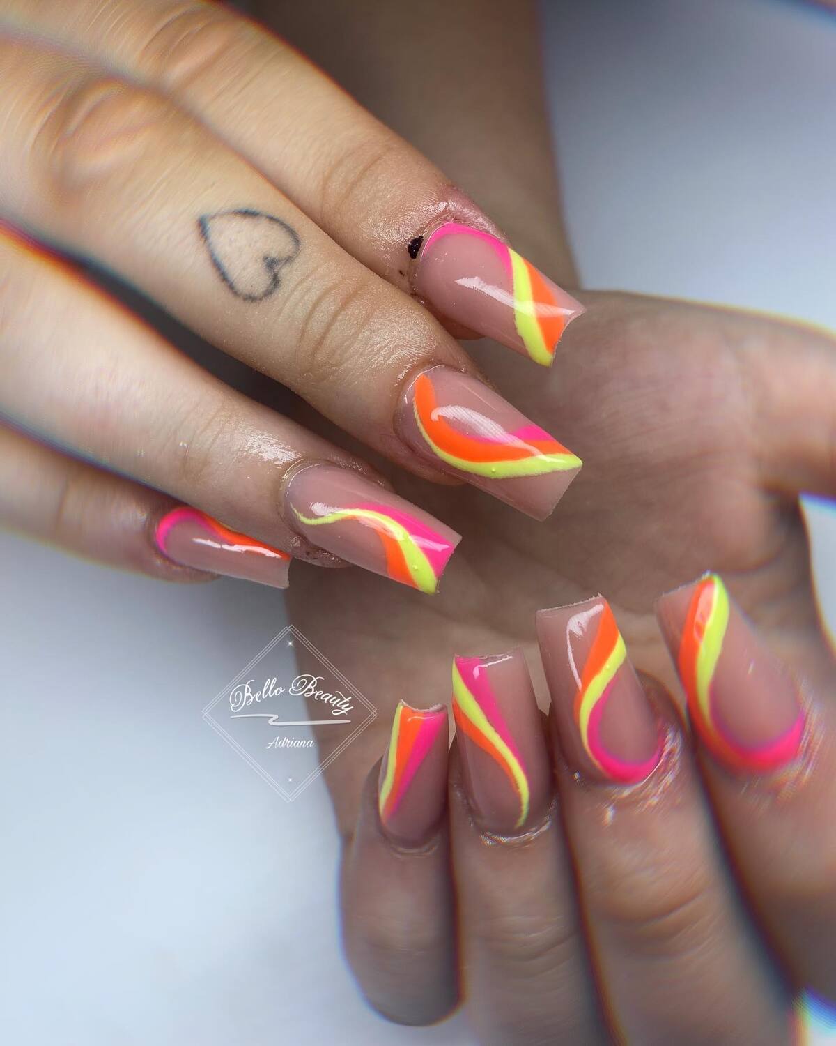21. Fiery Neon Swirls for a Bold Statement