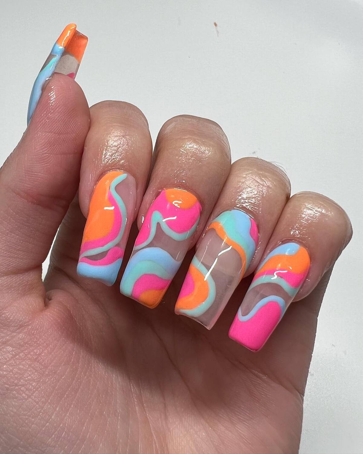 23. Pastel and Neon Swirls in a Dreamy Blend